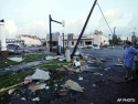 Sat., Aug. 14: A man surveys damage to Punta Gorda, Fla., after Hurricane Charley made landfall